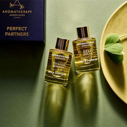 Aromatherapy Associates Perfect Partners Gift Set. 2 Premium Bath and Shower Oils (0.3 fl oz each) in Decorative Gift Box. Includes Deep Relax and Revive Morning Blends